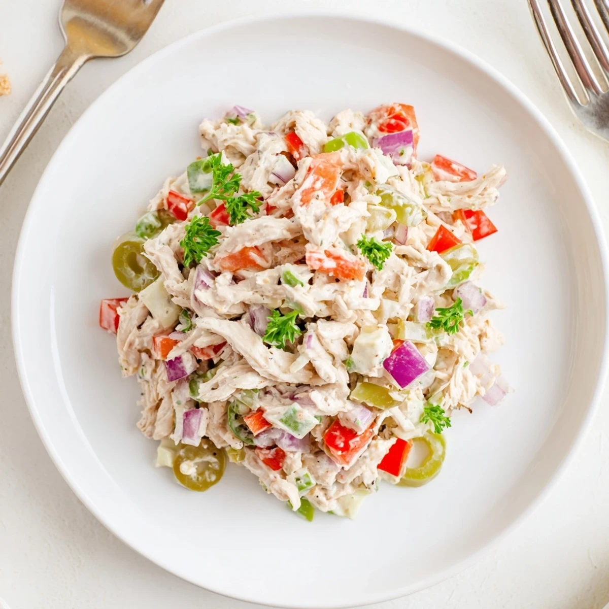 High Protein Pepperoncini Chicken Salad served in a wrap, tangy and satisfying