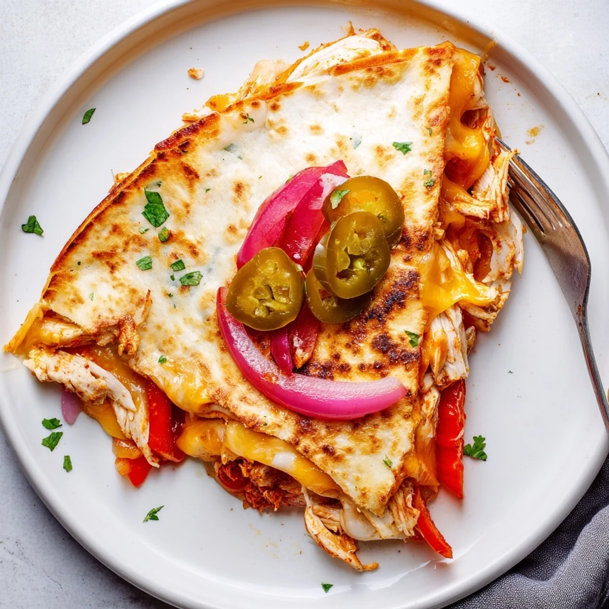 Spicy Crispy Grilled Chicken Quesadilla sizzling golden, melty cheese, charred peppers