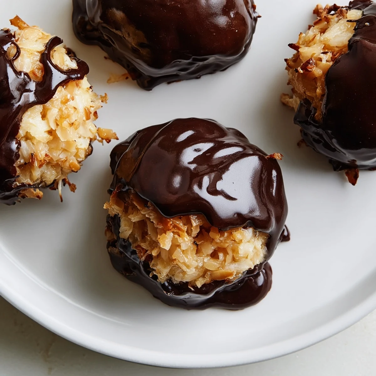 Bite-sized no bake Samoa treats featuring layers of caramel coconut chocolate