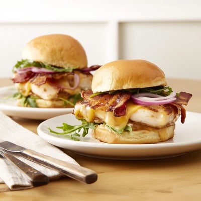 Savory chicken strips coated in sweet maple glaze and crispy bacon for a rich bite.
